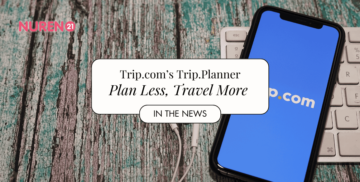 Trip.com showing on cellphone with earphones by the side