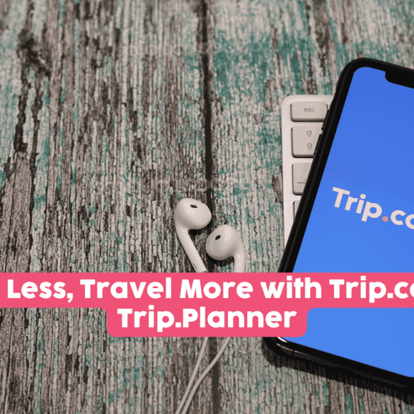 Trip.com showing on cellphone with earphones by the side
