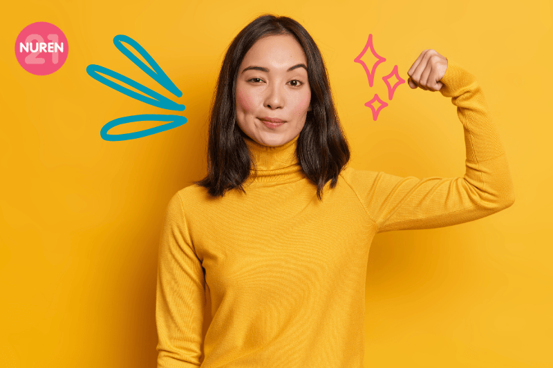 strong girl showing strong arms showcasing healthy overall lifestyle in isolated yellow background