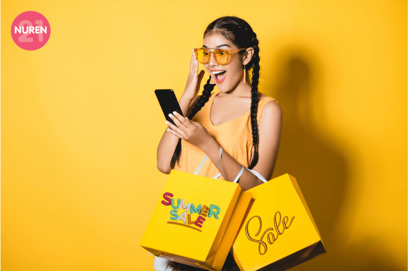 woman enjoying shopping with all the festive sale season