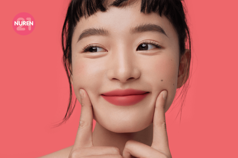 girl in bright pink isolated background smiling