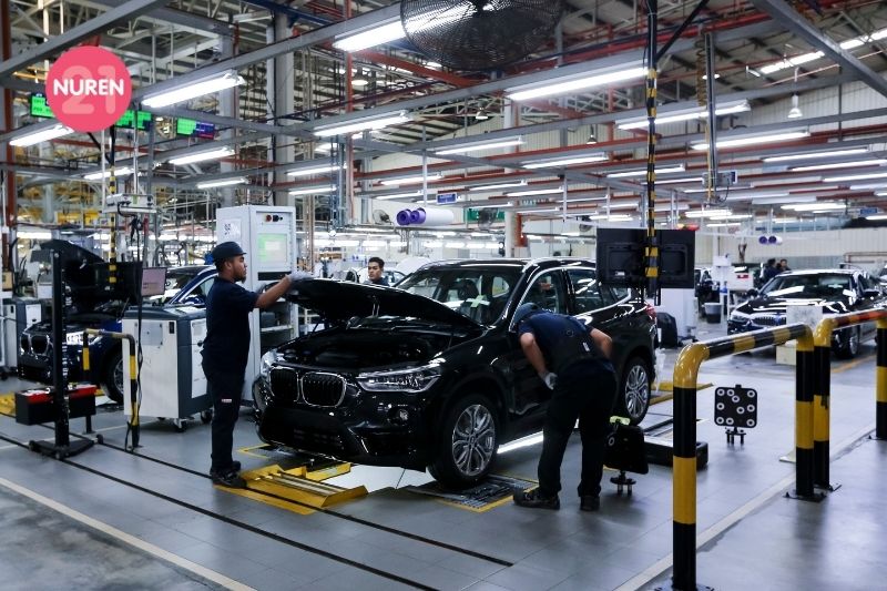 image of a car being serviced in a workshop