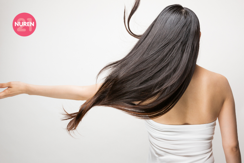 image of woman with long silky hair 