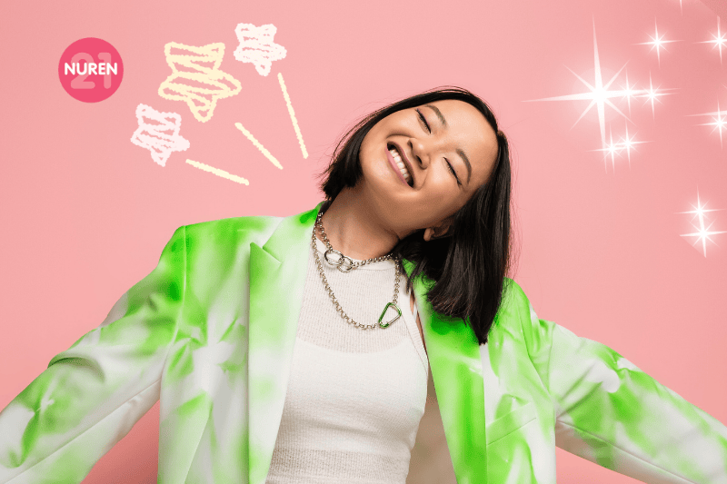 A happily jumping showing off her chain necklace