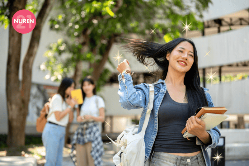 A woman happily flipping her hair and walking away as others gossip behind her