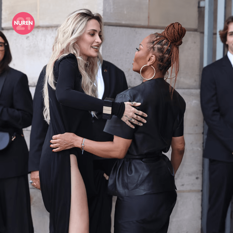 Paris and Janet Jackson embracing at Paris Fashion Week