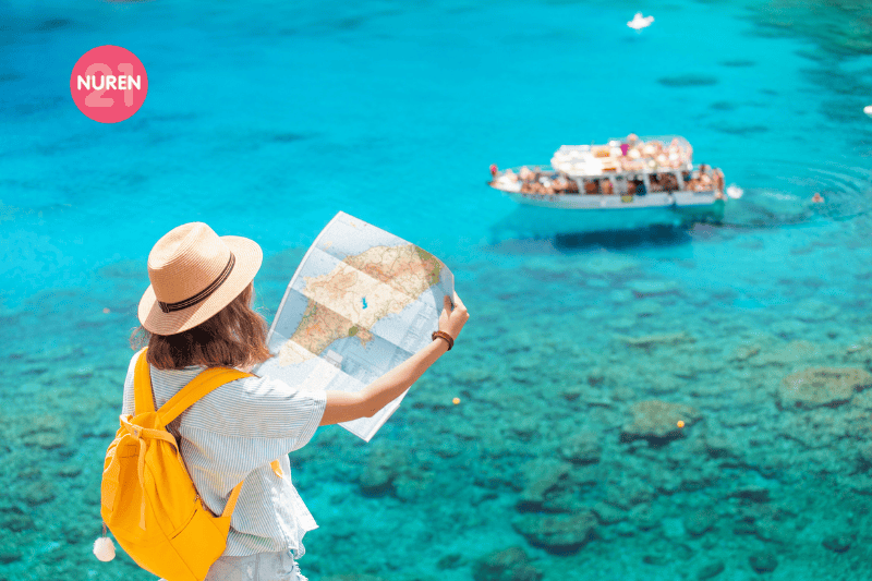 A tourist reading an island map