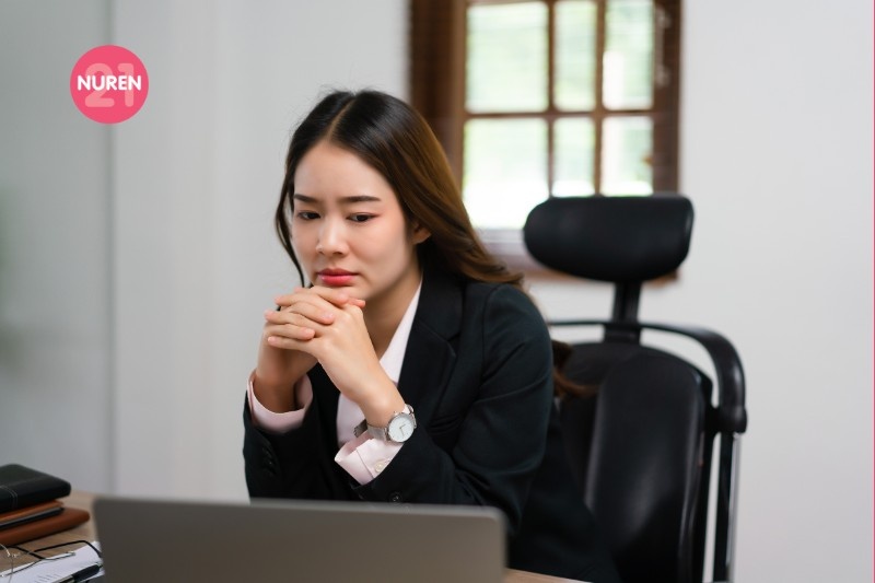 If they want you to step back then do so but you still do get worried for them A troubled woman sitting at her desk looking at her laptop
