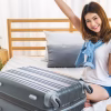 woman packing luggage bag ready for a holiday