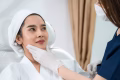 young Asian woman making cosmetology treatment skin injection, Mesotherapy of face beauty care