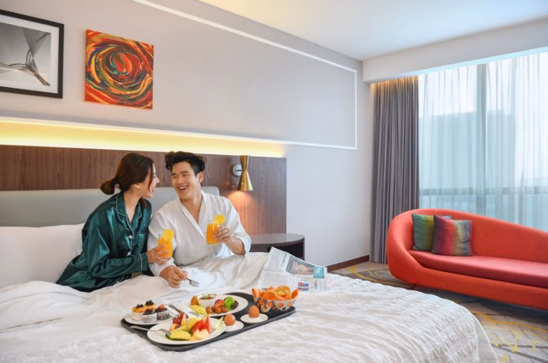 couple enjoying staycation in hotel in malaysia