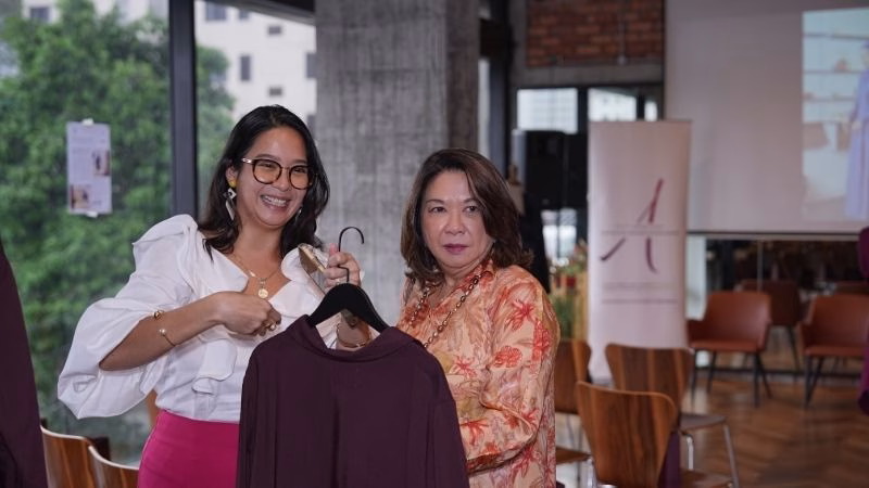 two women taking photo together at event foundation women led programme