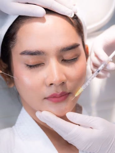 young Asian woman making cosmetology treatment skin injection, Mesotherapy of face beauty care