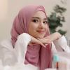 muslim woman with hijab showing dialy routine make up