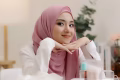 muslim woman with hijab showing dialy routine make up