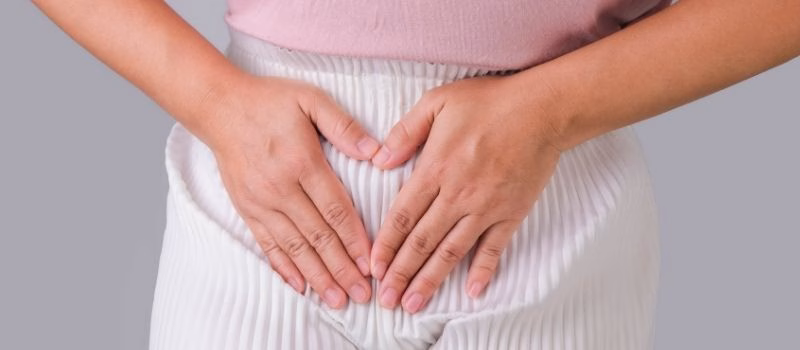 women holding uterus showcasing healthy vaginal health