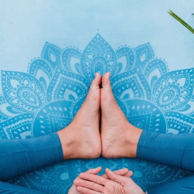 Women’s health. Female practicing yoga outdoors. Symbol of feminine health, fertility and healthy lifestyle. Concept of Holistic wellbeing, maternity, sustainable lifestyle, gynecology.