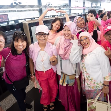 women in pink in solidarity for breast cancer awareness